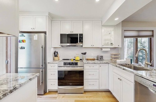 Quechee House | Dog-friendly townhome with views, AC & fireplace - walk to Village of Quechee