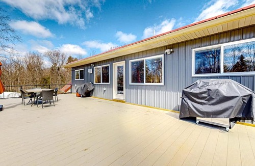 Rockwood House | Dog-friendly apartment by Moosehead Lake with sprawling deck & firepit