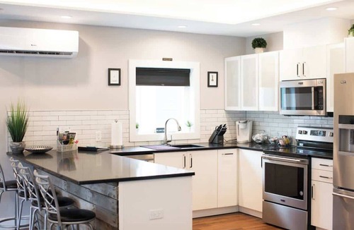 Geneva House | Downtown Solar Home w/Hot Tub & Billiards