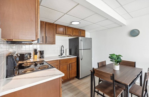 Central Business District Apartment | East 116 I Corporate 1Bd Suite in Rochester I Gym