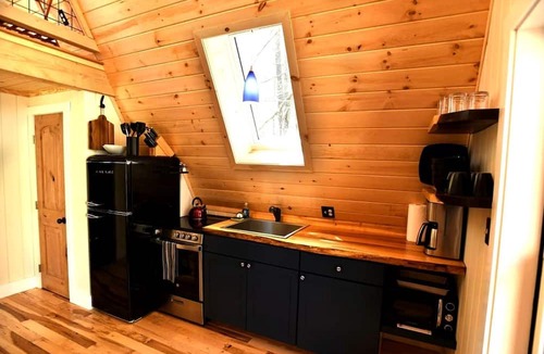 Springvale Cabin | Eco-Friendly Solar Powered A-Frame Treehouse with Hot Tub and Private Dock on Littlefield Pond, near Wells, Maine