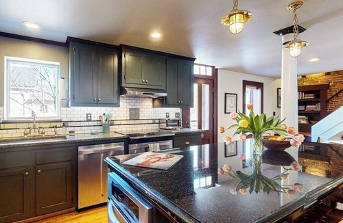 Belfast House | Elegant Victorian Gothic Revival home with wet bar, sunroom, & washer/dryer