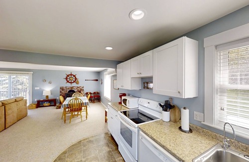 Mid-Coast and Islands House | Enjoy spectacular sunset and water views from the deck and balconies with water access.
