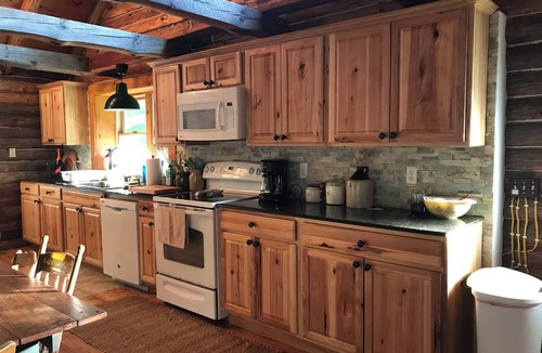 East Worcester Cabin | Escape to the country at our creek-side log cabin.