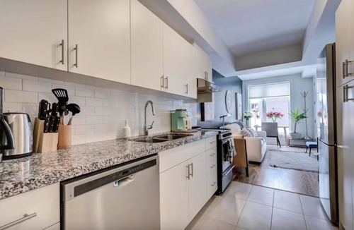 North York House | Etobicoke Elegance: Tech StaynSociable Living - Toronto: CRE-E at 51 Creekbank n