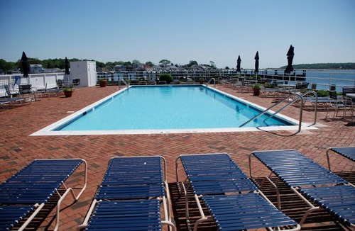 Greenport House | Exquisite Waterfront Townhome in Greenport with Pool and Boat Slip. Walk to all!