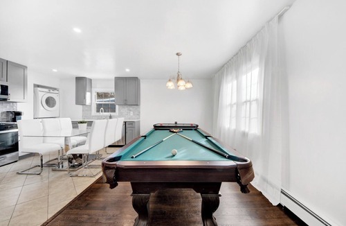 White Plains Apartment | Family-Friendly 3BR Home Game Room Free Parking Minutes from NYC