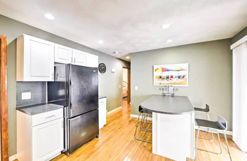 Narragansett Pier Apartment | Family Friendly Charming cottage set within a mile of the beach and steps to Boon Street!