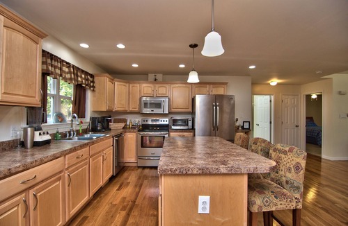 Rowland House | Family-friendly Modern Mountain Getaway with open floor plan and large deck