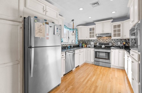 Northwest Harwich House | Family Retreat West Harwich with deck and large backyard