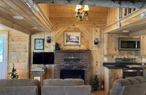 Belgrade House | Famous cottage directly on 100' private shoreline of pristine lake.