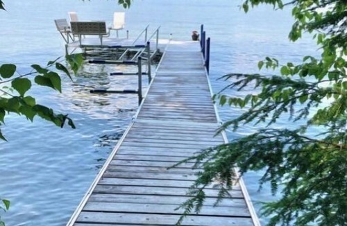 Belgrade House | Famous cottage directly on 100' private shoreline of pristine lake.