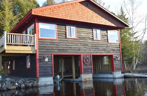 Tupper Lake Cabin | Four seasons Boathouse on Tupper Lake (FOR SALE). Please inquire if interested.