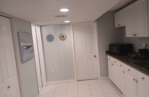 Lisgar Apartment | furnished basement studio, with1 queen bed, a kitchenette, and 1 bathroom.