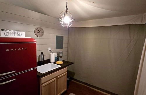 Voluntown RV Rental | Glamping Safari Tent with Firepit & Private Deck in Voluntown, Connecticut
