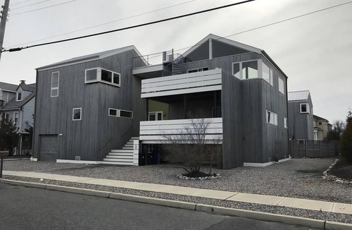 North Beach Haven House | Heated Pool. Beach Badges. Roof Top Deck with Views. Private yard. 140396