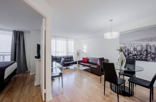 Bay Street Corridor Apartment | High Floor Bay St. Condo (Sleeps 4) w. Large Balcony Walk to Sick Kids Hospital