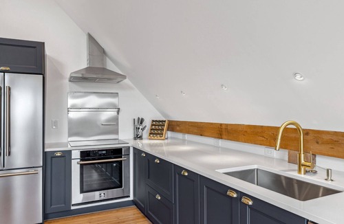 Barnard House | Historic Riverside Home with Sauna & Covered Porch