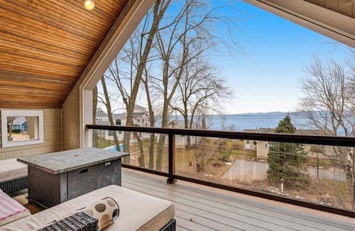 Malletts Bay House | Home on Lake Champlain with pool, hot tub, in-home gym, firepit, & lovely views