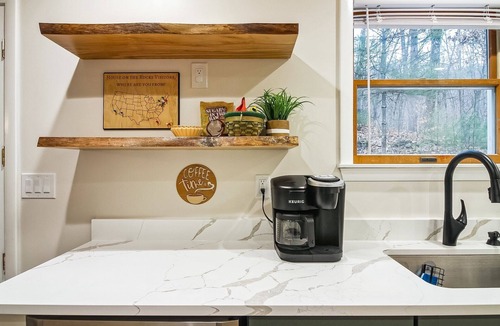 Chittenden House | House on The Rocks with EV Charger