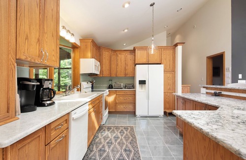 Hillsdale House | Hudson Valley Private Retreat with 3 bedrooms, 2 living spaces, and a pond.