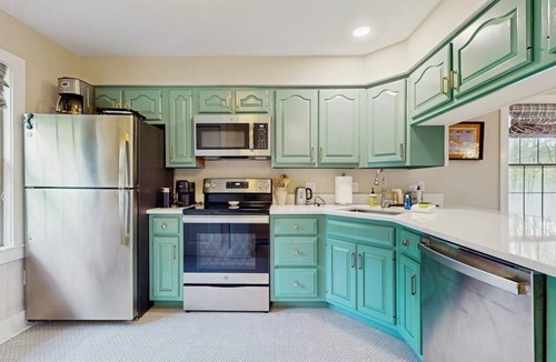West Hartford Condo | Inviting three-story condo with decks - near the Quechee Club