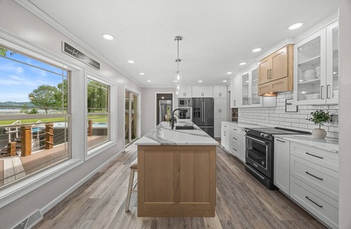 Bradford House | Island View Cottage: Lamoka lake home with pickleball court, hot tub, sauna, and game room
