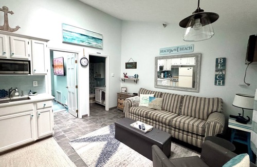 Wells Condo | King Size Bed Tennis Courts view condo at Nautical Mile Resort