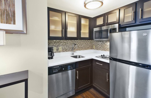 Mayfield Heights Condo | King Suite | 24-Hour Business Center, Fitness Center + Free Daily Breakfast
