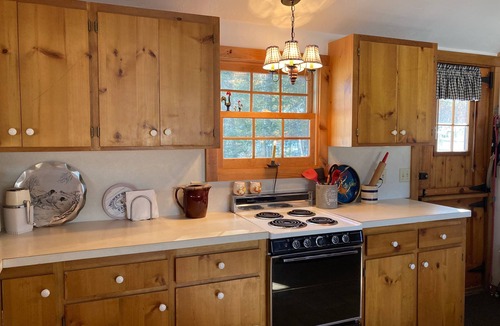 Freedom Cabin | Lake Ossipee New Hampshire waterfront cabin with beach, dock, fire pit, privacy.