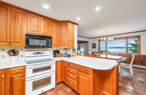 Melvin Village House | Lake Winnipesaukee Waterfront home on Melvin Bay with Dock Sleeps 12