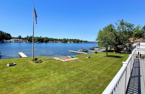 Lochmere House | Lakefront 3-bedroom Duplex on Lake Winnisquam, docks, Beach, WiFi, AC. B1A
