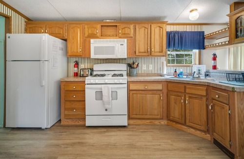 Seneca Falls House | Lakefront at its finest—two homes, a private beach, and spectacular Cayuga Lake views.