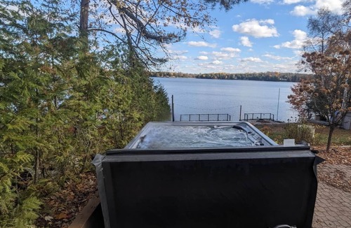 Erinsville House | Lakefront Beaver Lake Retreat with Hot Tub, Private Dock, Firepit & Water Toys