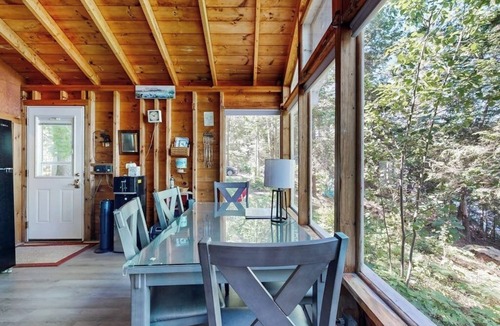 Bremen Cabin | Lakefront cottage with dock, screened porch, & Island in Biscay Pond