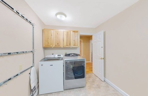 Colchester House | Lakefront home with pool, beach access, central AC, washer/dryer, & fireplace