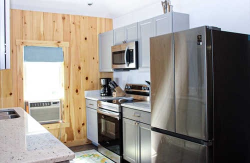 Laconia Cottage | Lakefront home with a deck, gas grill, WiFi, dock & golf nearby