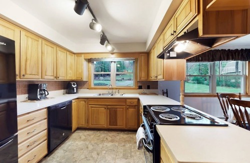 Norway House | Lakehouse home with private dock, firepit, grill, kayaks and canoes