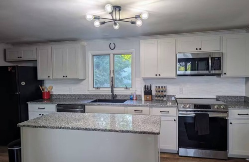 Raymond House | Lakehouse with large level yard on pristine Little Sebago Lake