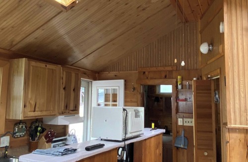 Naples Cottage | Lakeside 1 bedroom cottage sleeps up to 4. Perfect serenity in Naples. Wifi