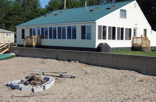 Malletts Bay House | Lakeside cottage w/mountain views, canoes, firepit, enclosed porch, bbq, beach