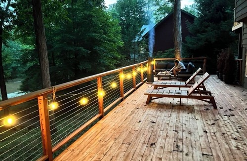 Athens House | Lakeside family compound and artist's retreat