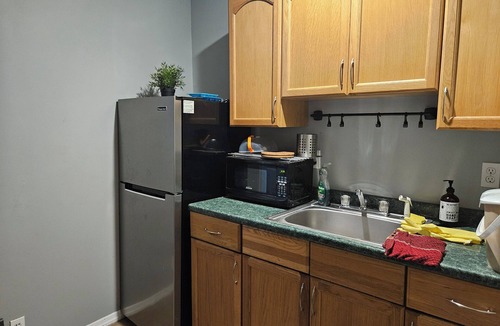 Kings Park Apartment | Long Island Pool Getaway - Private apartment with shared pool/hot tub.