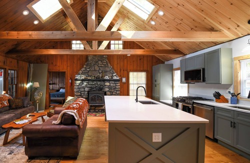 Harrison House | Long Lake cottage with spacious screened porch and excellent sunset views!