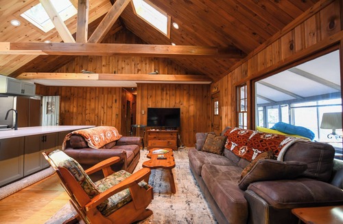 Harrison House | Long Lake cottage with spacious screened porch and excellent sunset views!