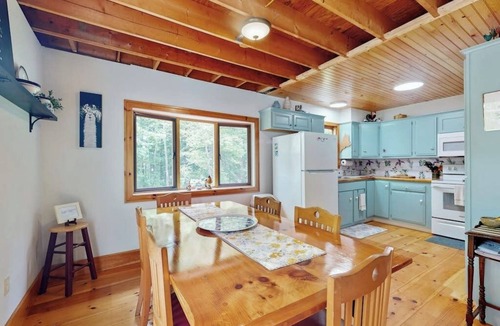 Warren House | Loon's Cry on South Pond- Sunny, lakefront home with private dock, great deck & firepit