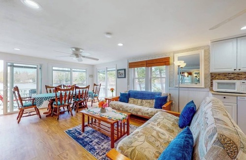 South Sanford House | Lovely lakefront home with deck, fire-pit, grill, private dock & pet friendly