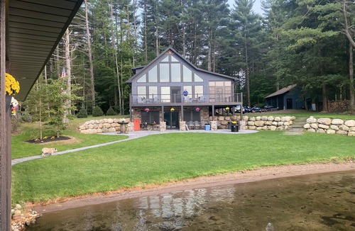 Woodgate House | Luxurious/Modern Adirondack home with gorgeous boathouse, sandbar & sunset view