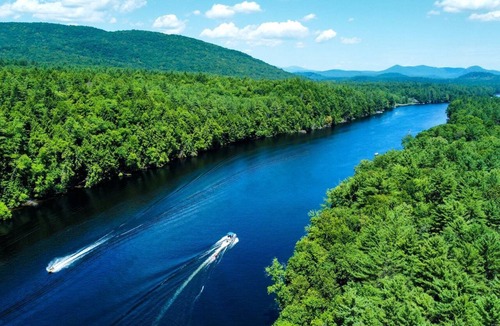 Corinth RV Rental | Luxury Canvas Group Glamping Tent | Adirondacks in Corinth, NY