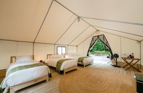 Corinth RV Rental | Luxury Canvas Group Glamping Tent | Adirondacks in Corinth, NY